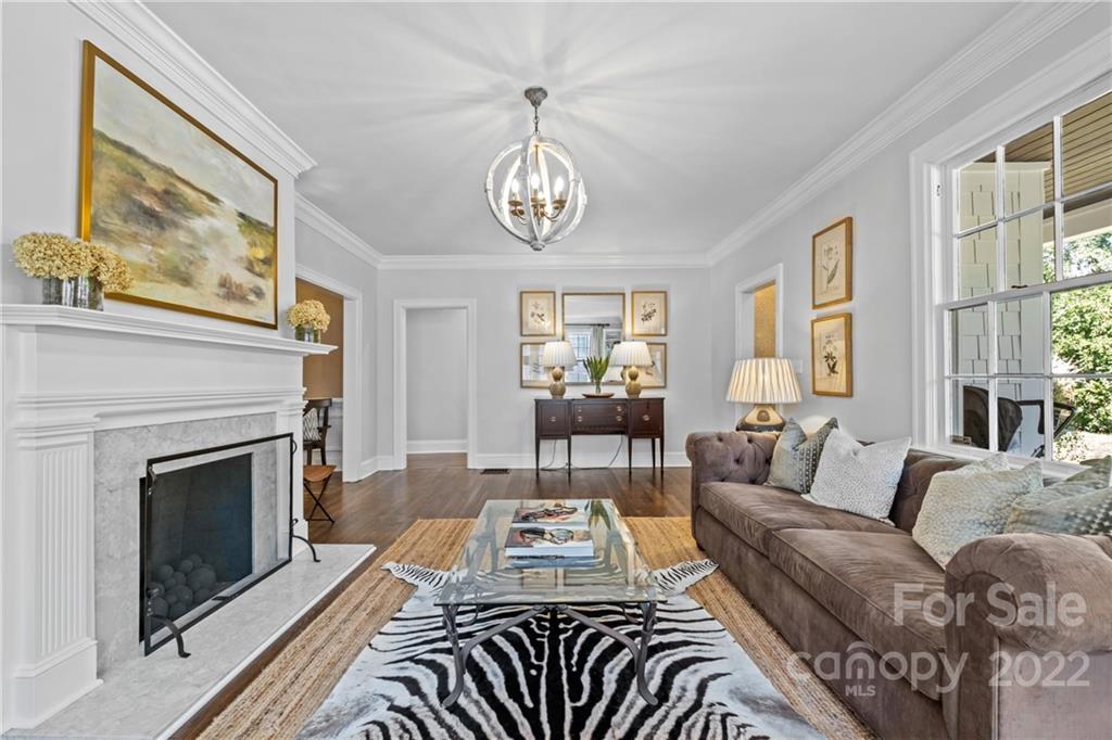 2156 Colony Road Charlotte, NC 28209 - Photo 8 of 46 a living room with furniture a fireplace and windows