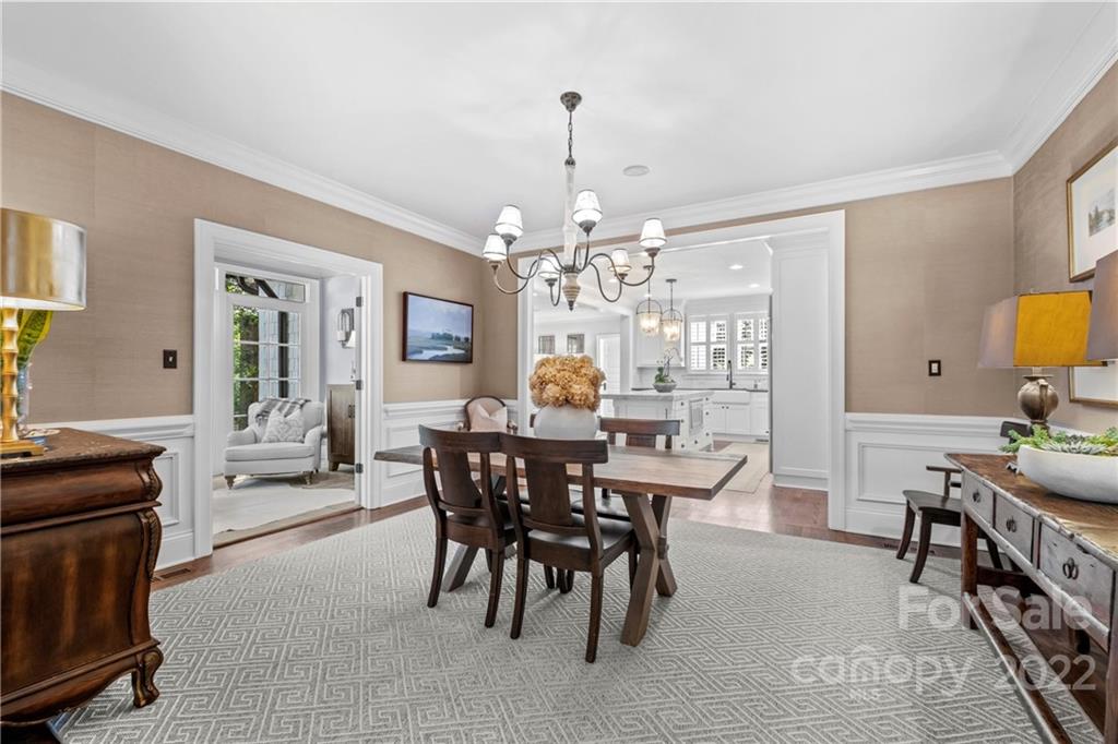 2156 Colony Road Charlotte, NC 28209 - Photo 9 of 46 a view of a dining room with furniture and chandelier