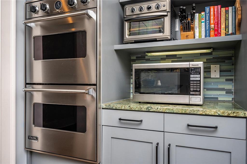 123 Ansley Street Decatur, GA 30030 - Photo 14 of 61 a stove top oven sitting inside of a kitchen and stove