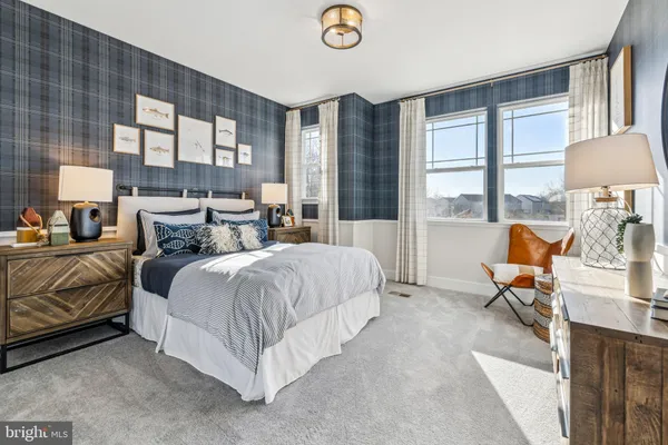 a bed room with a bed and a table