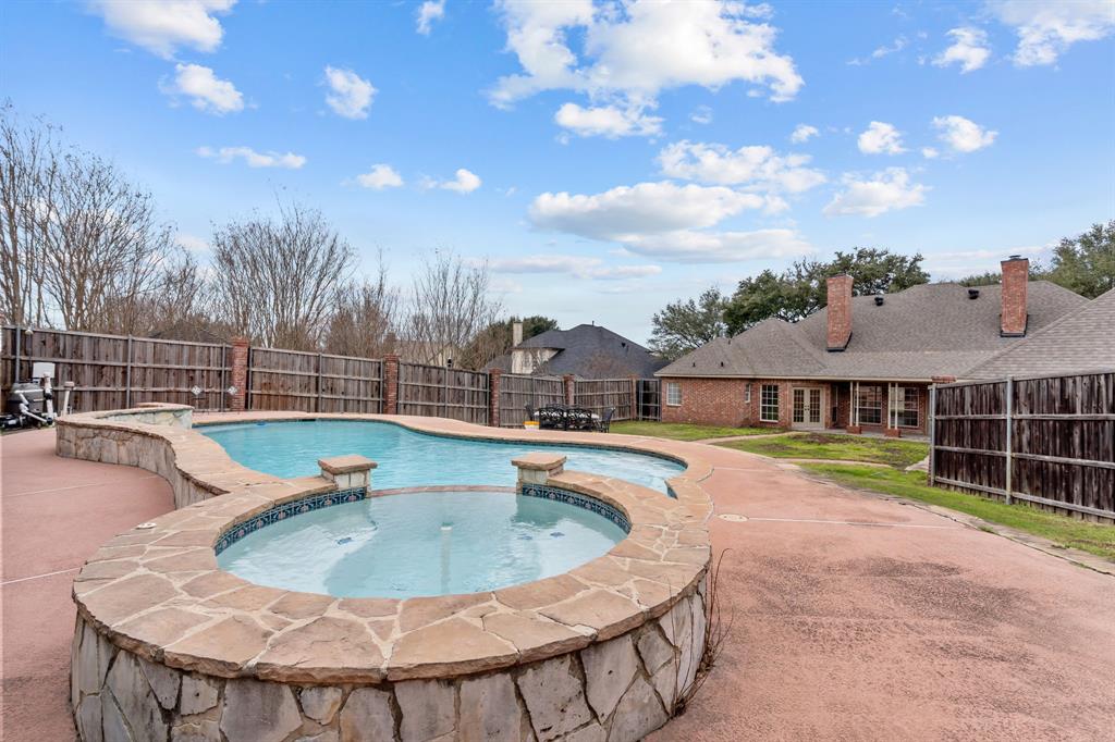 4510 Dexham Road Rowlett, TX 75088 - Photo 28 of 33 a view of a house with swimming pool and sitting area