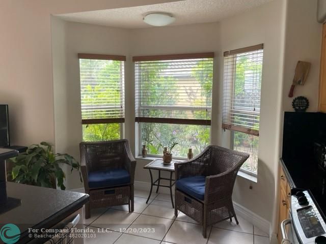 Keystone Lake Pembroke Pines, FL 33029 - Photo 11 of 23 a living room with furniture and a window