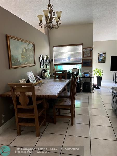 Keystone Lake Pembroke Pines, FL 33029 - Photo 16 of 23 a view of a dining room with furniture
