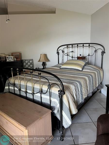 Keystone Lake Pembroke Pines, FL 33029 - Photo 17 of 23 a bedroom with a bed and with view of closet