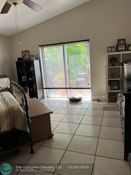 Keystone Lake Pembroke Pines, FL 33029 - Photo 18 of 23 a view of a livingroom with furniture and an empty room