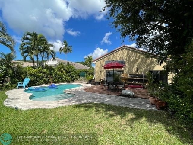 Keystone Lake Pembroke Pines, FL 33029 - Photo 4 of 23 a view of a house with swimming pool and sitting area