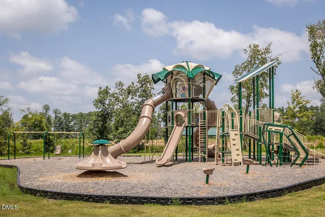 a view of a house with a park