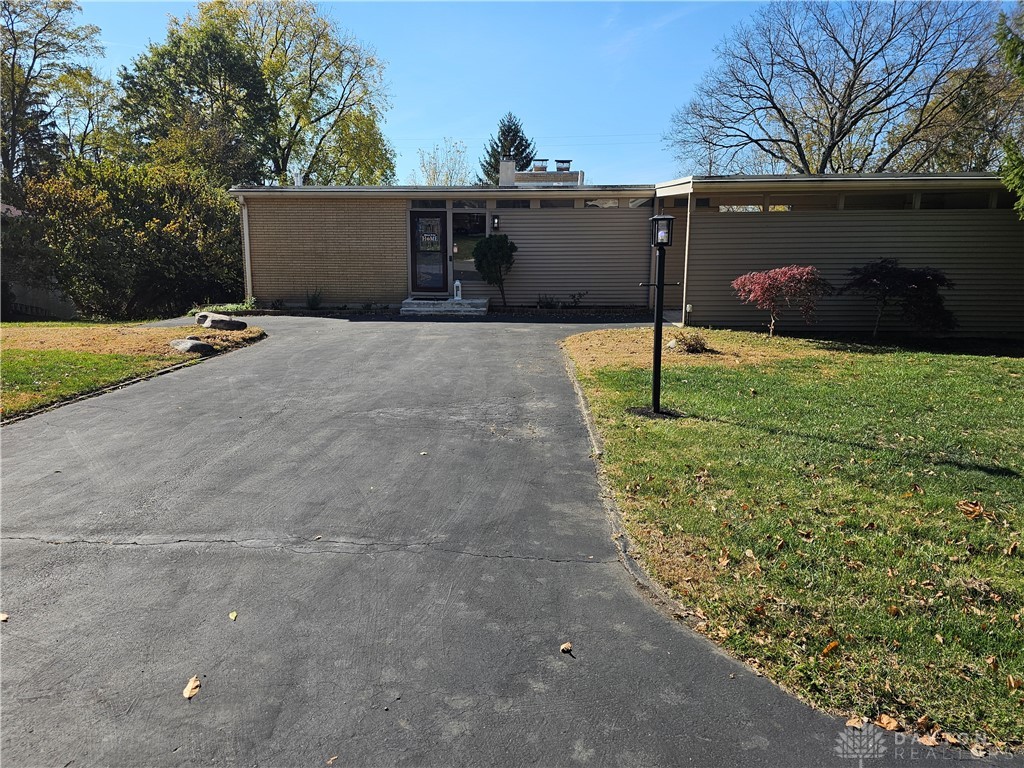 3121 Spring Hill Road Dayton, OH 45434 - Photo 1 of 35 top driveway and front of house with carport and storage