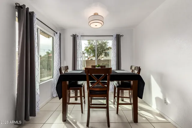 a kitchen with stainless steel appliances granite countertop a refrigerator stove and sink