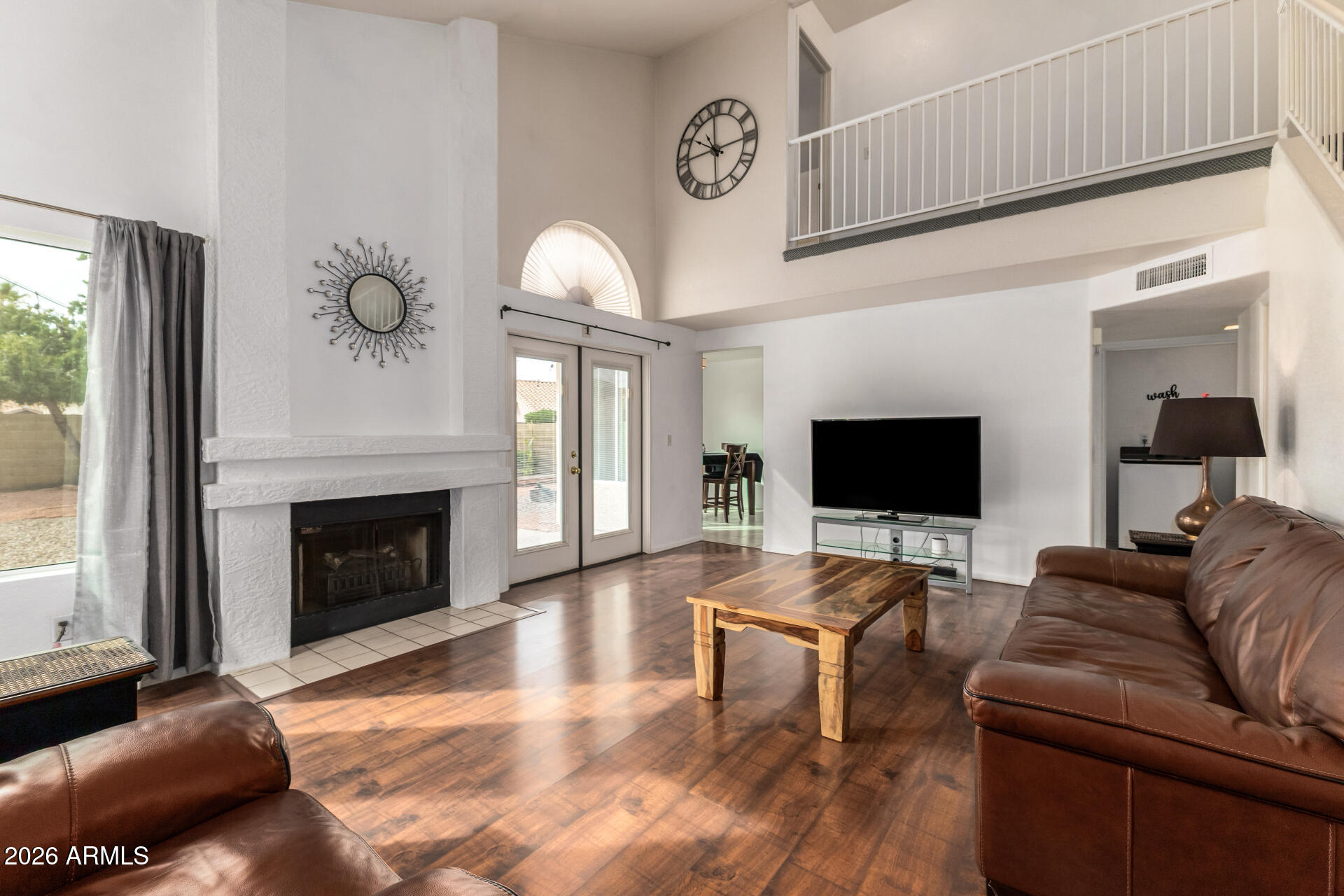 4313 East Desert Trumpet Road Phoenix, AZ 85044 - Photo 2 of 75 Living Room w/tons of light & Fireplace!