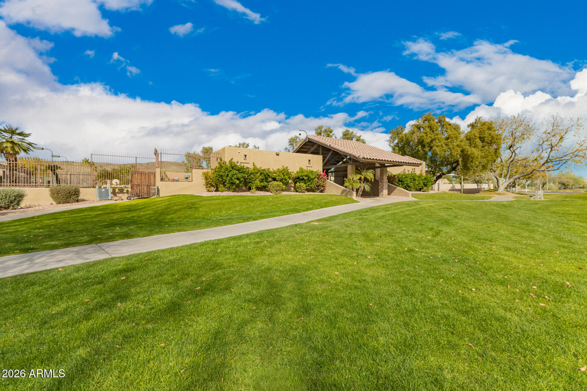 4313 East Desert Trumpet Road Phoenix, AZ 85044 - Photo 45 of 75 Community has lush grass & walking paths