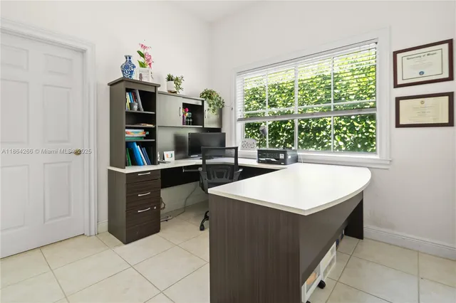 a kitchen with a cabinets and window
