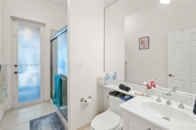 a bathroom with a sink and toilet