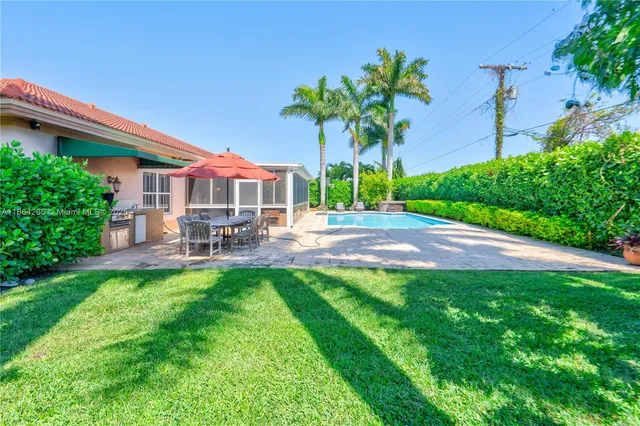 a house with garden in front of it