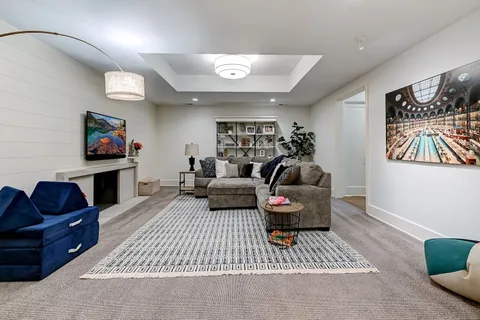 a view of a backyard with sitting area and furniture