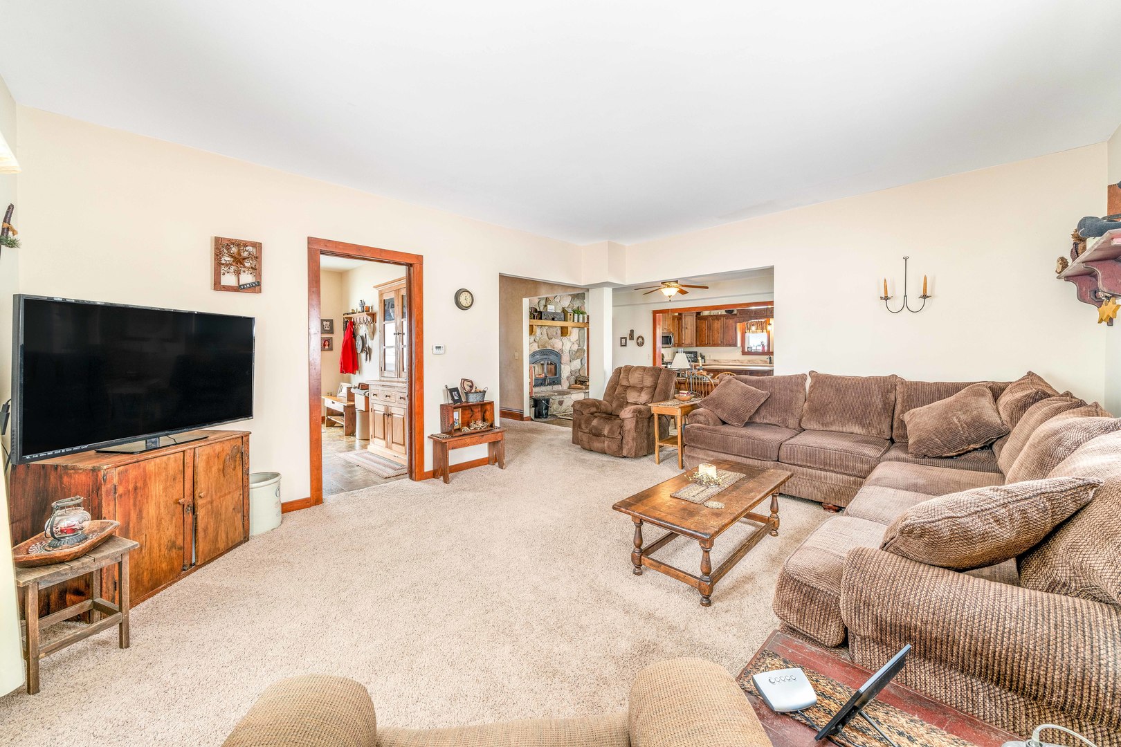 3478 Chicago Road Paw Paw, IL 61353 - Photo 14 of 49 a living room with furniture and a flat screen tv