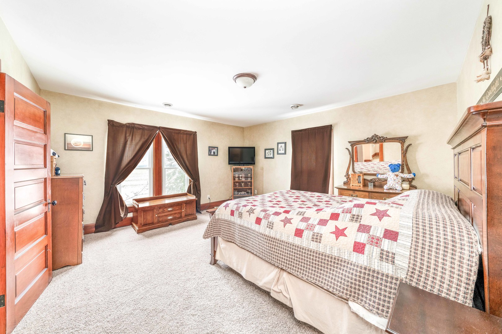 3478 Chicago Road Paw Paw, IL 61353 - Photo 19 of 49 a bedroom with a bed and wooden floor