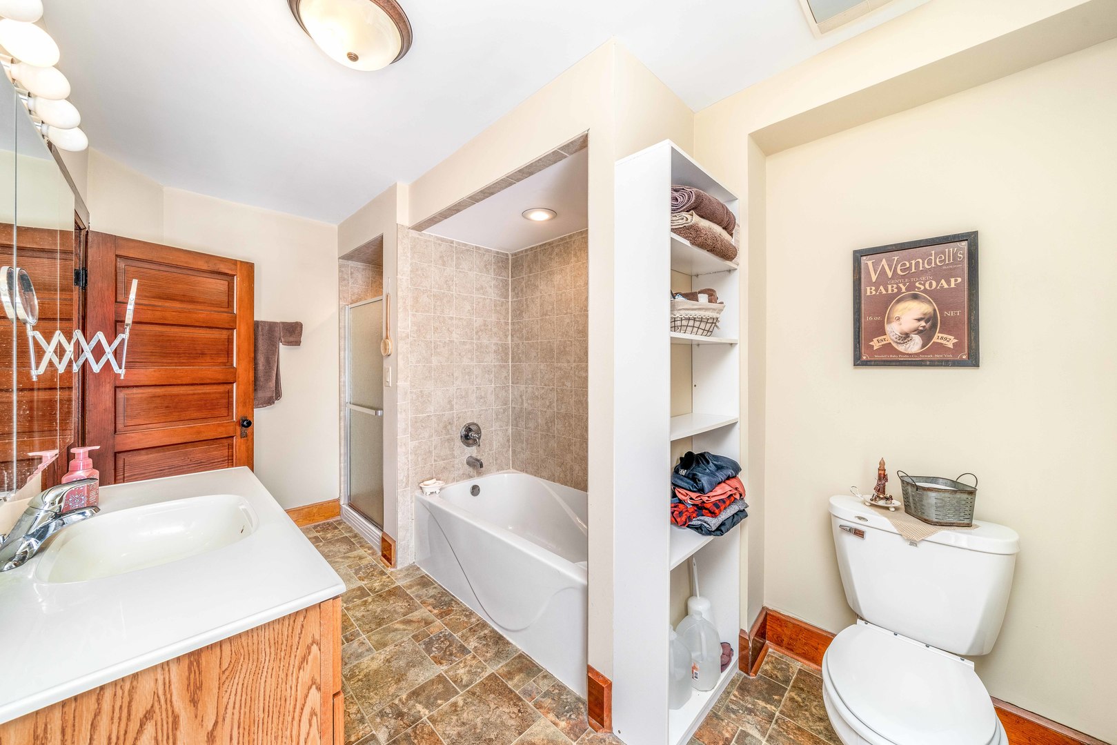 3478 Chicago Road Paw Paw, IL 61353 - Photo 24 of 49 a bathroom with a sink toilet and shower