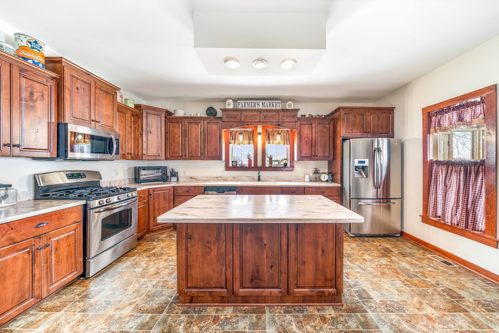 3478 Chicago Road Paw Paw, IL 61353 - Photo 6 of 49 a kitchen with stainless steel appliances granite countertop a sink stove and refrigerator