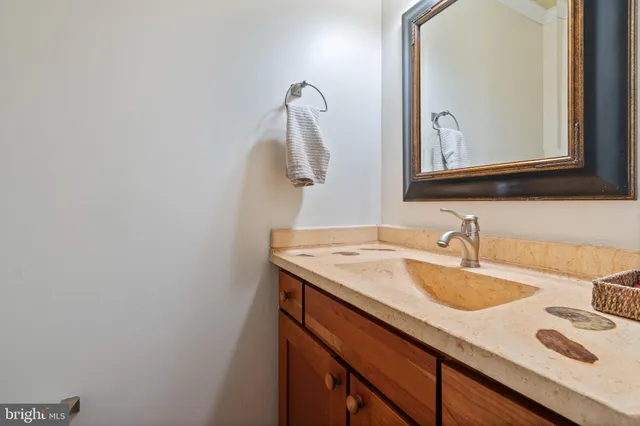 a view of a dining room with furniture wooden floor and chandelier