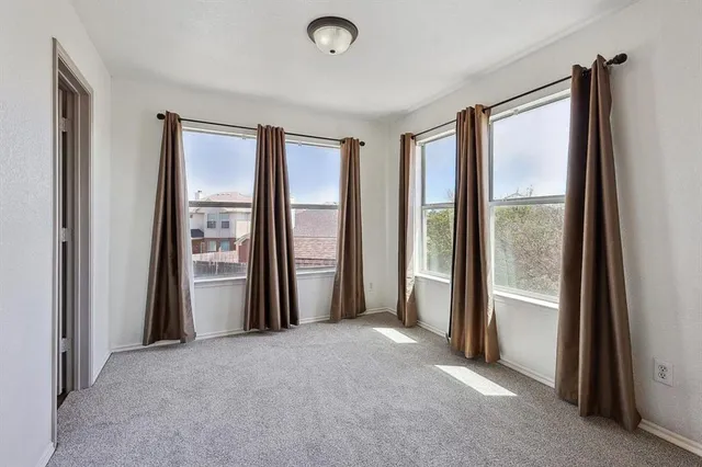 a view of a room with a large window