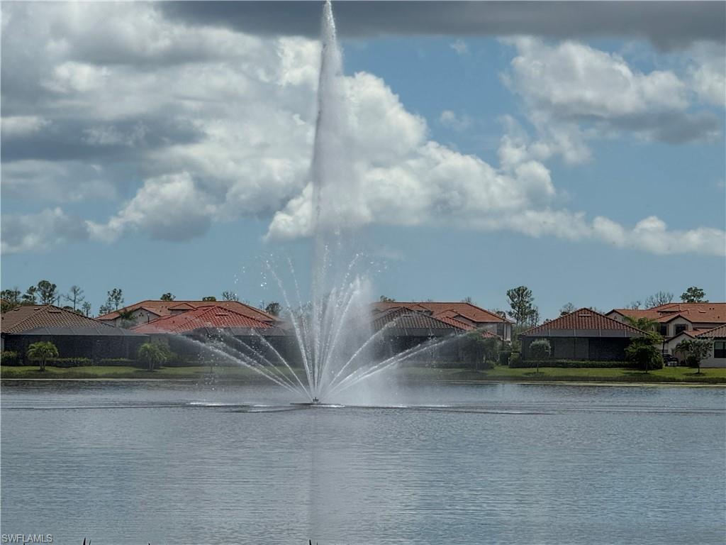 1431 Santiago Circle, Unit 1901 Naples, FL 34113 - Photo 24 of 29 a view of a lake