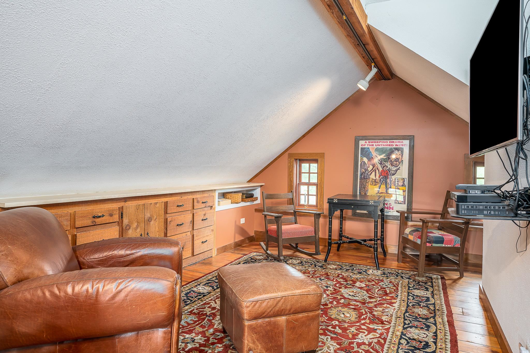 6775 West Blackjack Road Hanover, IL 61041 - Photo 20 of 33 a living room with furniture a rug and a floor to ceiling window
