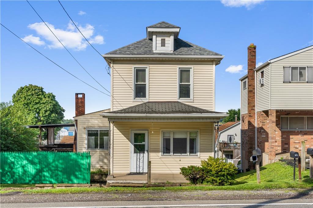 620 Virginia Avenue Rochester, PA 15074 - Photo 1 of 36 a front view of a house with a yard