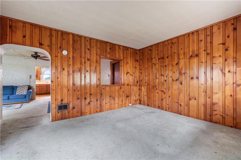 620 Virginia Avenue Rochester, PA 15074 - Photo 5 of 36 a view of an empty room with wooden walls