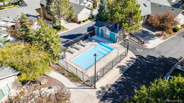 an aerial view of house with yard