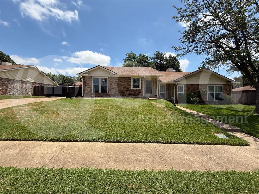 3000 Timothy Lane Euless, TX 76039 - Photo 17 of 19 Brick and siding exterior with a gabled roofline