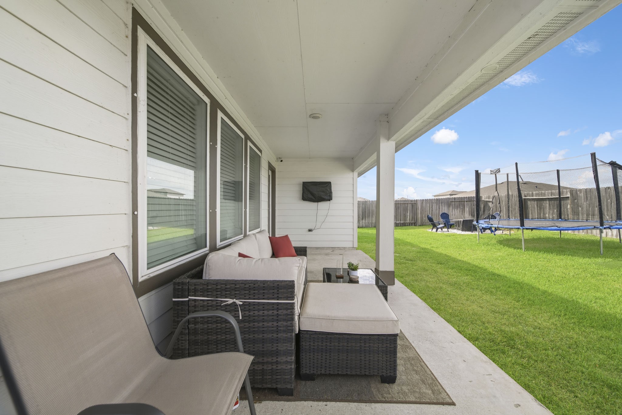 8210 Buck Lane Rosharon, TX 77583 - Photo 27 of 30 Covered patio space offering a comfortable setting for seating and outdoor enjoyment.