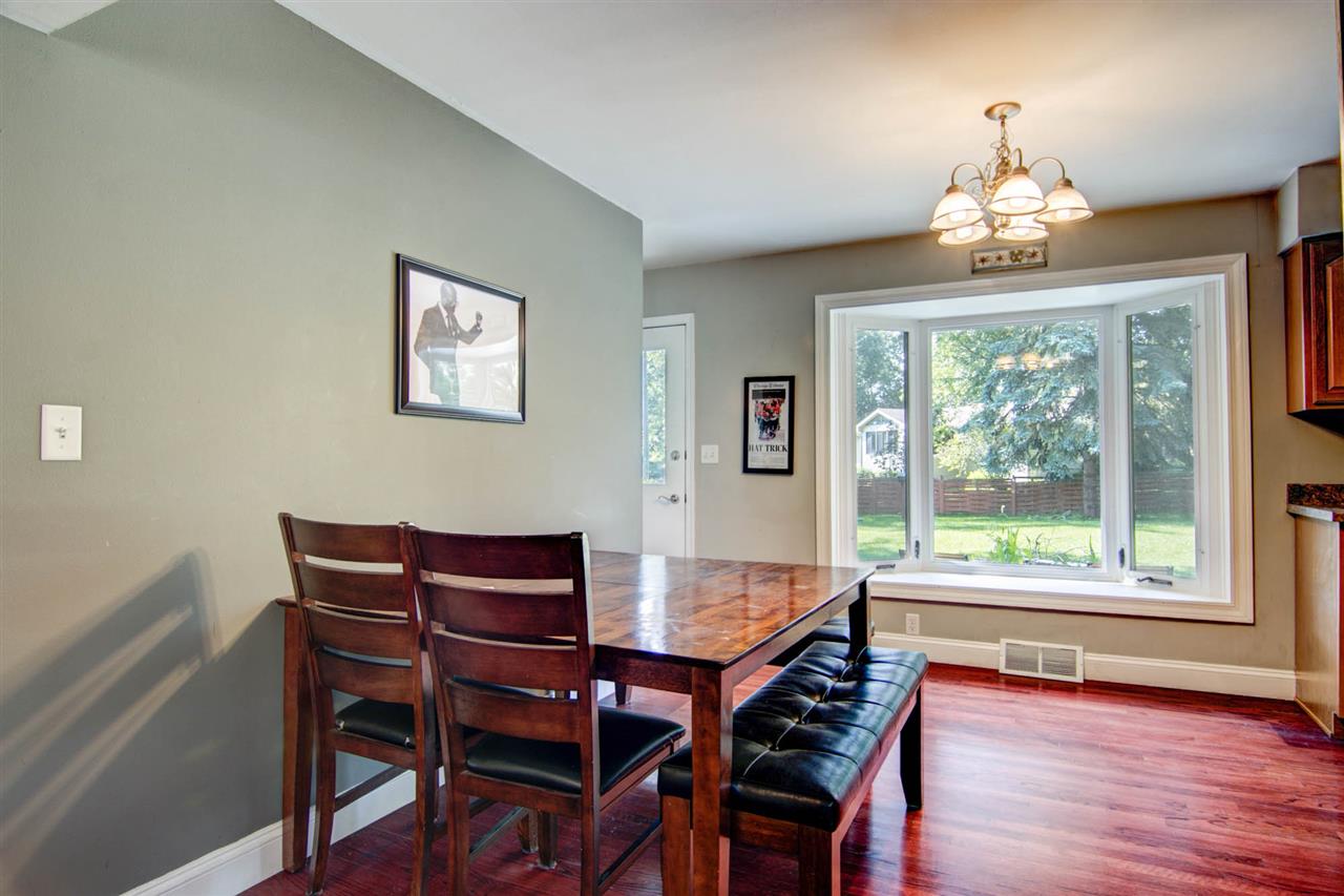 5981 Whitecliff Road Rockford, IL 61109 - Photo 5 of 25 a view of a dining room with furniture window and outside view