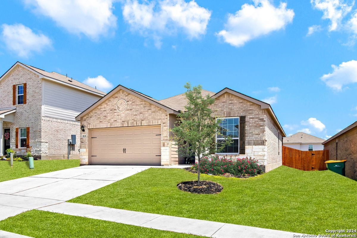 9219 Bennett Forest Converse, TX 78109 - Photo 1 of 23 a view of a house with backyard and garden