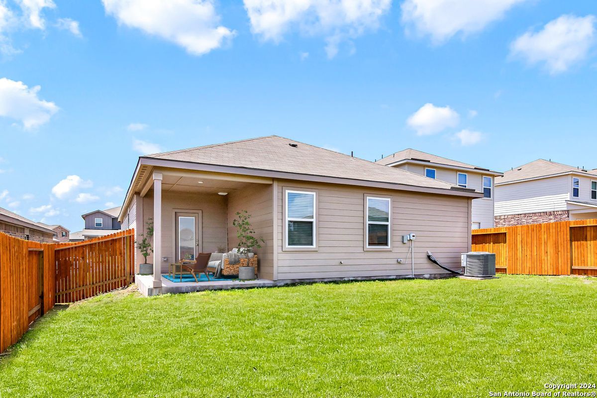 9219 Bennett Forest Converse, TX 78109 - Photo 23 of 23 a front view of a house with a yard