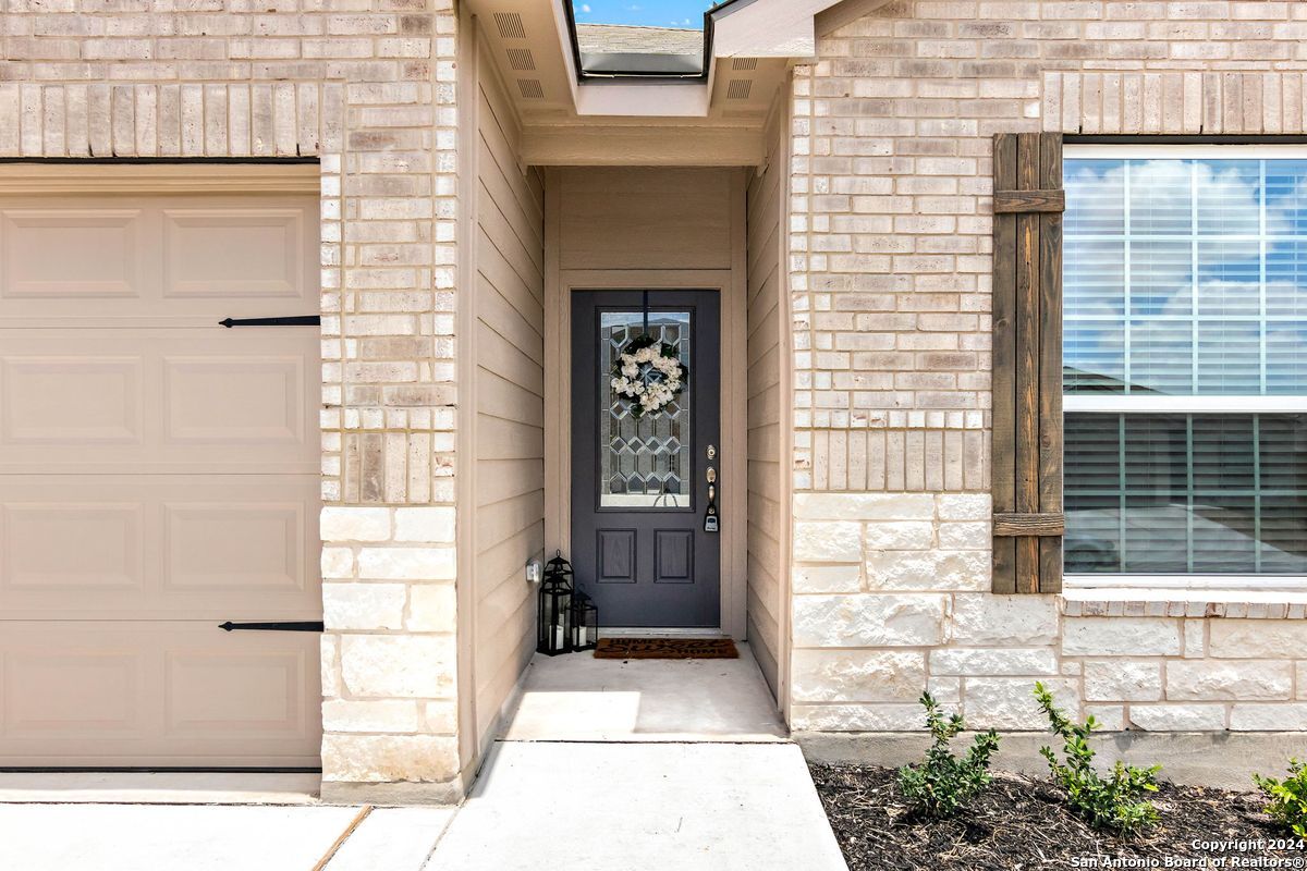 9219 Bennett Forest Converse, TX 78109 - Photo 3 of 23 a view of entrance door of the house