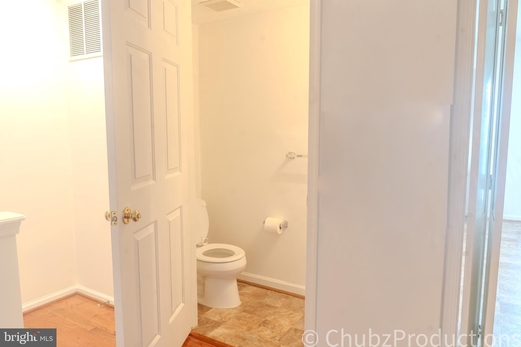 8316 Widgeon Place Laurel, MD 20724 - Photo 26 of 32 a bathroom with a toilet