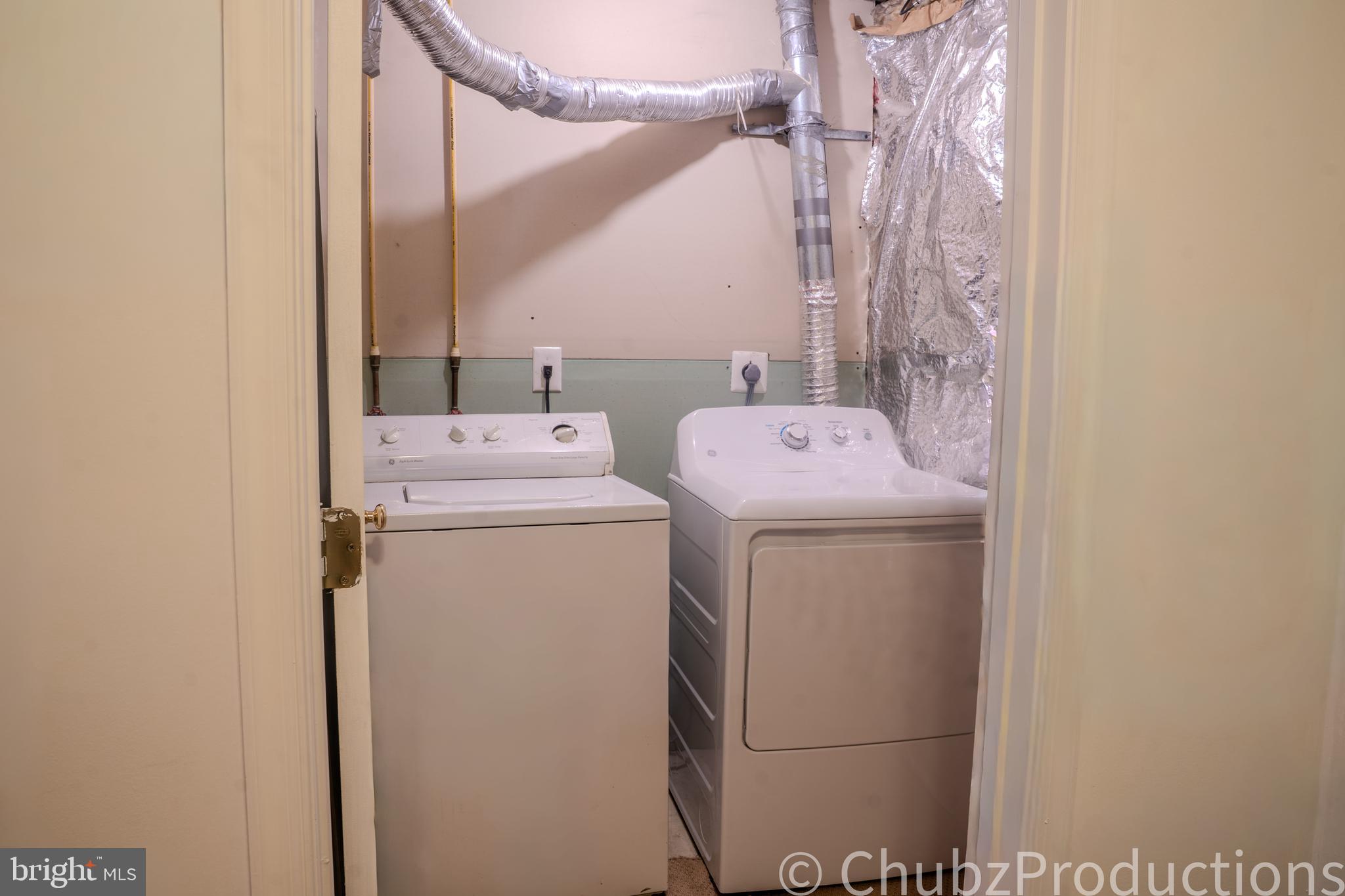 8316 Widgeon Place Laurel, MD 20724 - Photo 32 of 32 a utility room with dryer and washer