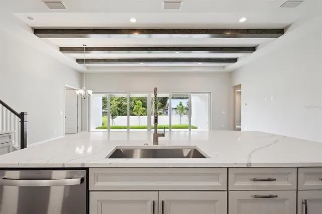 a view of a kitchen from a window