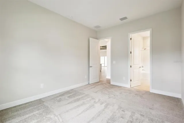 a bathroom with a sink toilet tub and shower