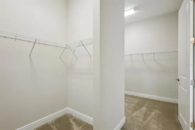 a view of a room with racks on the wall