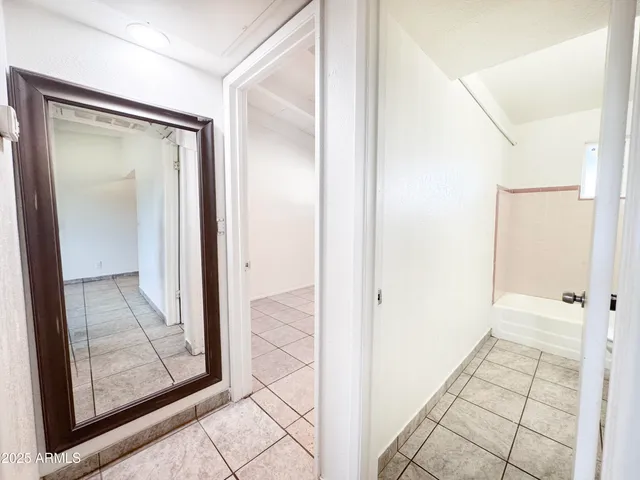 a kitchen with stainless steel appliances granite countertop a stove and a refrigerator