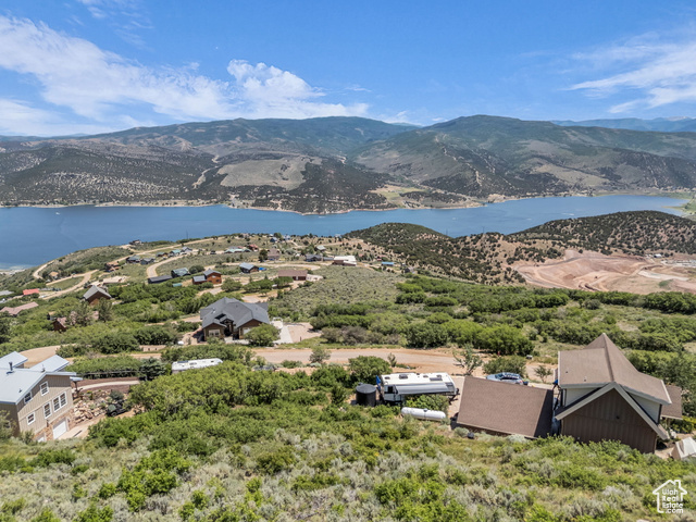 293 Ridge Top Road, Unit 184 Coalville, UT 84017 - Photo 1 of 26 Drone / aerial view of a water and mountain view