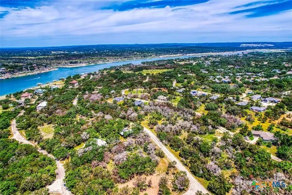 a view of a city with an ocean