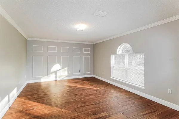 a view of kitchen with wooden floor