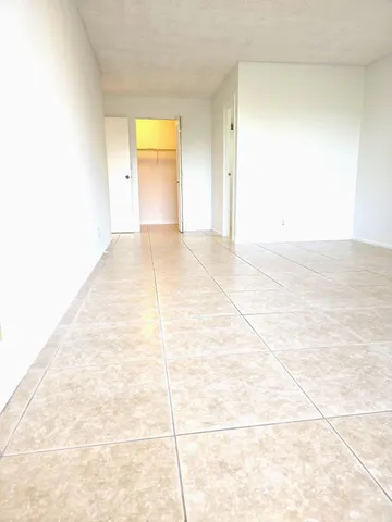 a view of a garden with a patio