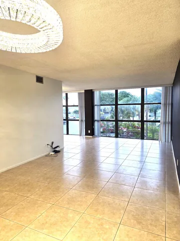 a bathroom with a toilet a sink and a mirror
