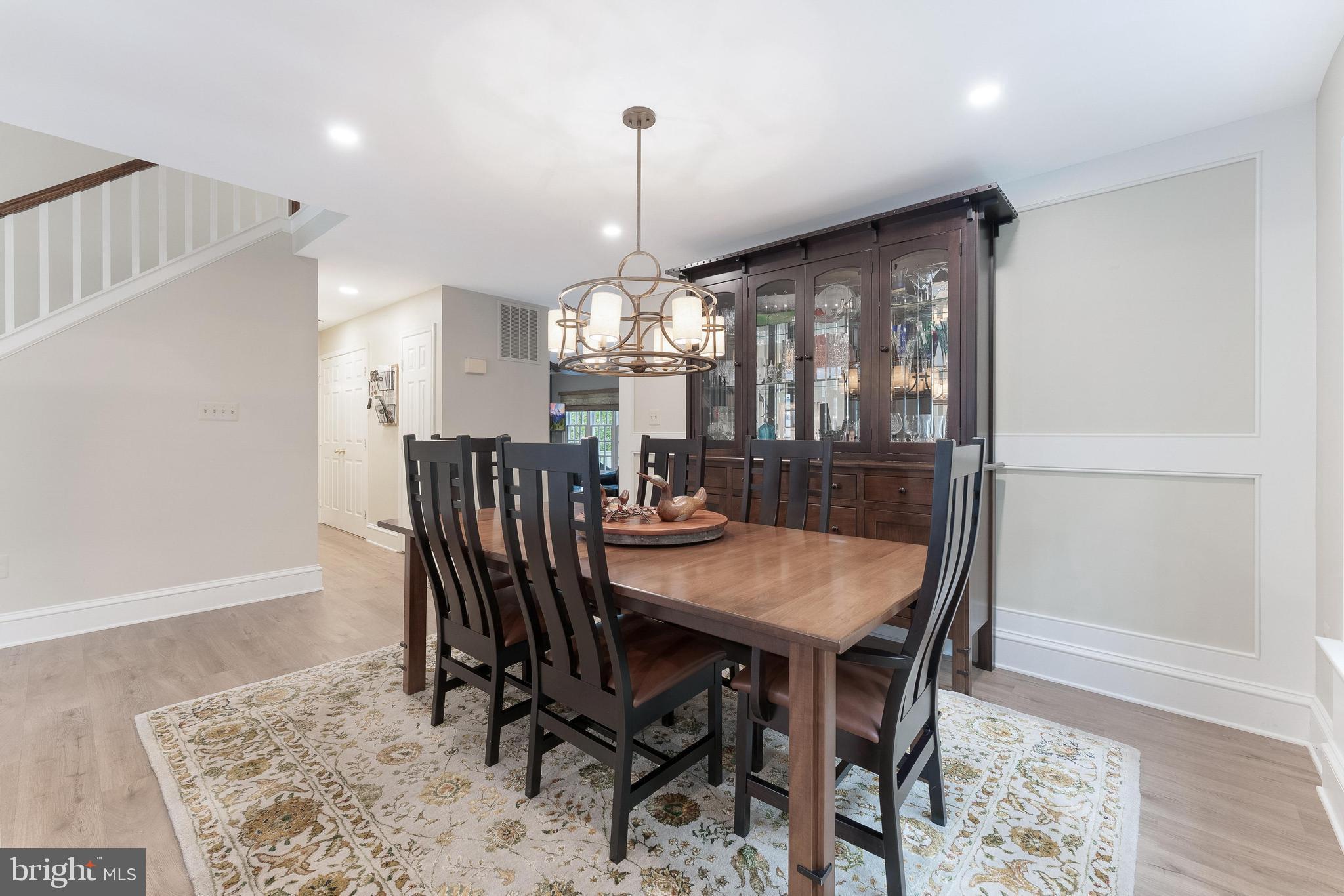 1248 Lamplighter Way Reston, VA 20194 - Photo 12 of 64 a view of a dining room with furniture window and wooden floor
