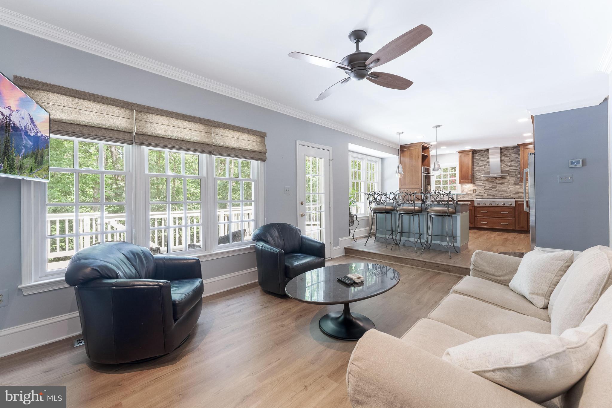 1248 Lamplighter Way Reston, VA 20194 - Photo 22 of 64 a living room with furniture and a large window