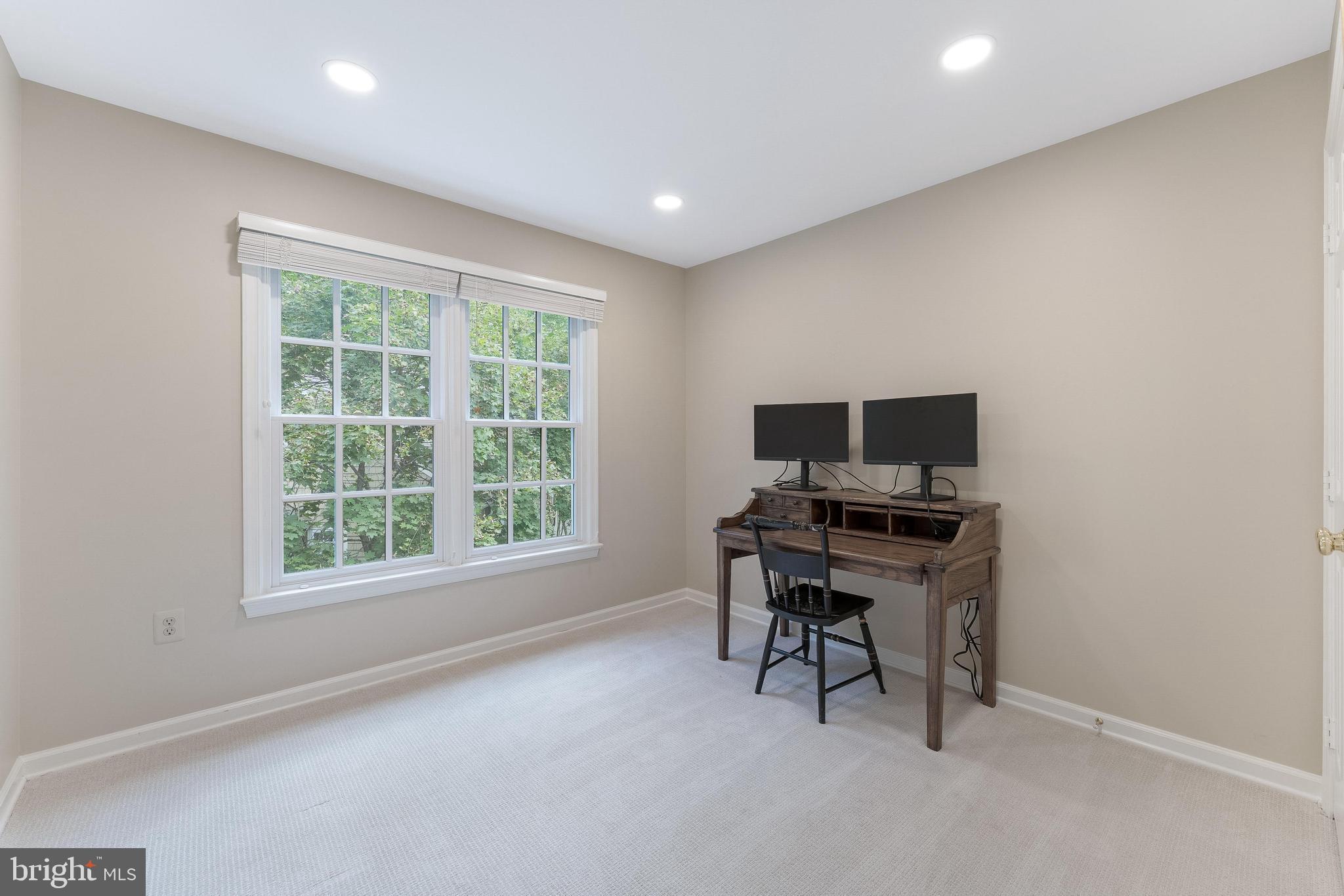 1248 Lamplighter Way Reston, VA 20194 - Photo 37 of 64 a view of a workspace with furniture and a window
